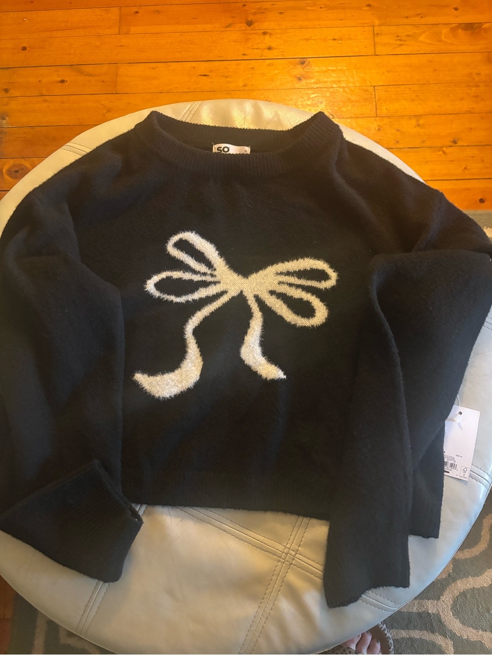 SO Black Sweater with Cream Bow Graphic
